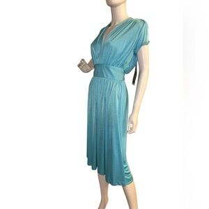 Joy Stevens, DRESS STYLE VINTAGE
7OS...size 9/10 NWT